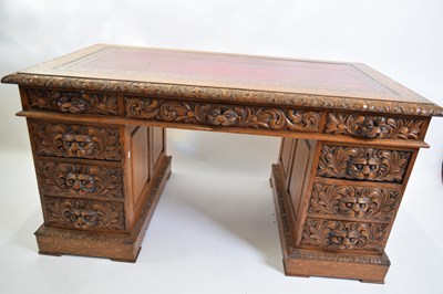 Lot 331 - Victorian Gothic oak twin pedestal desk fitted...