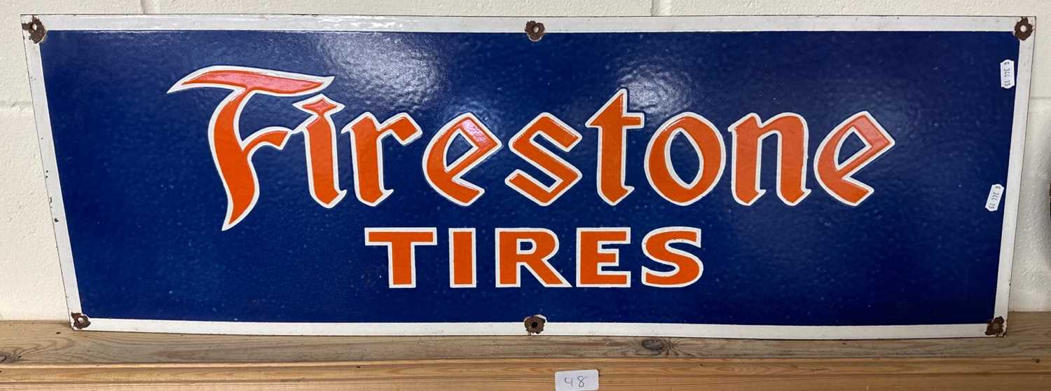Lot 48 - A reproduction metal sign for "Firestone Tires"