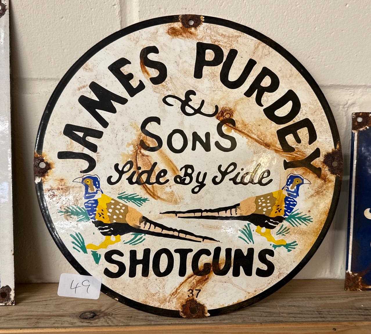 Lot 49 - A reproduction enamelled sign for "James...