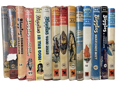 Lot 21 - W E JOHNS: A collection of Biggles books...