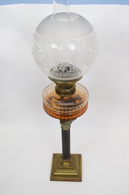 Lot 38 - Oil lamp with white glass shade and amber...