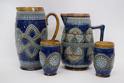 Lot 80 - Large Doulton ware jug together with a further...