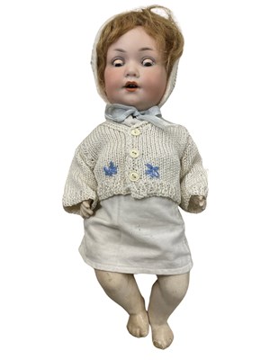 Lot 229 - An Armand Marseille bisque head character doll,...