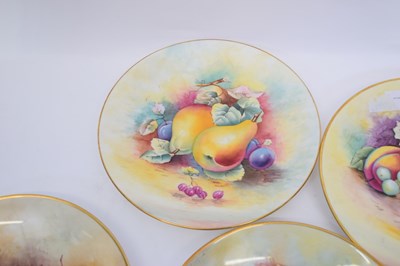 Lot 110 - Group of four hand painted Minton fruit plates,...