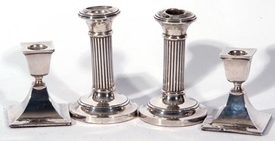 Lot 168 - Pair of George V small silver candlesticks,...