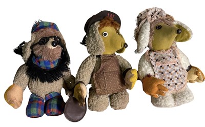 Lot 164 - Three 1970s sheepskin Womble soft toys,...