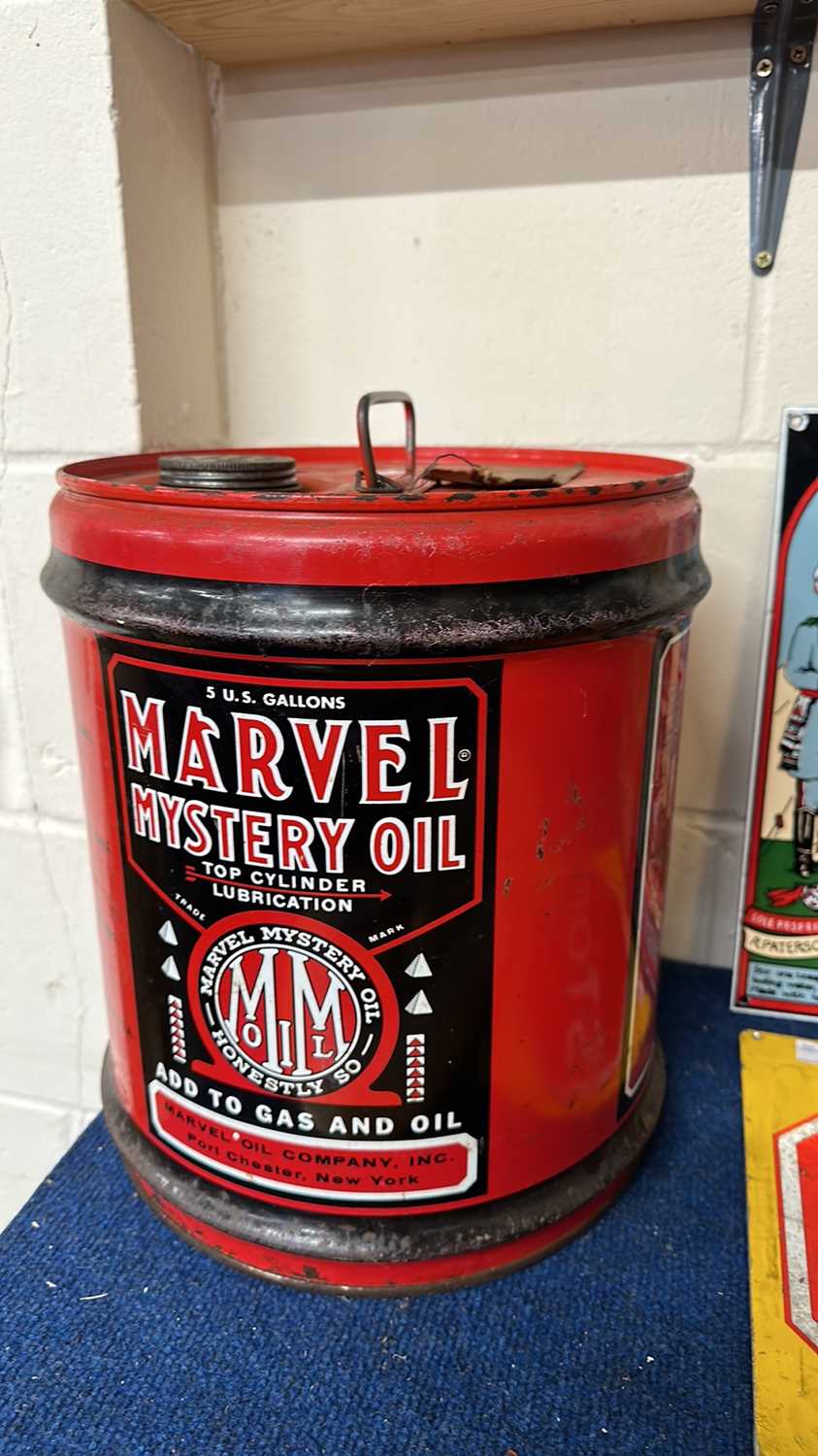 Lot 63 - A vintage barrel Marvel Mystery Oil (empty), 5...