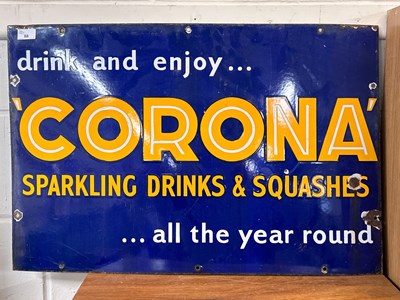 Lot 88 - An enamel sign, Drink and Enjoy Corona...