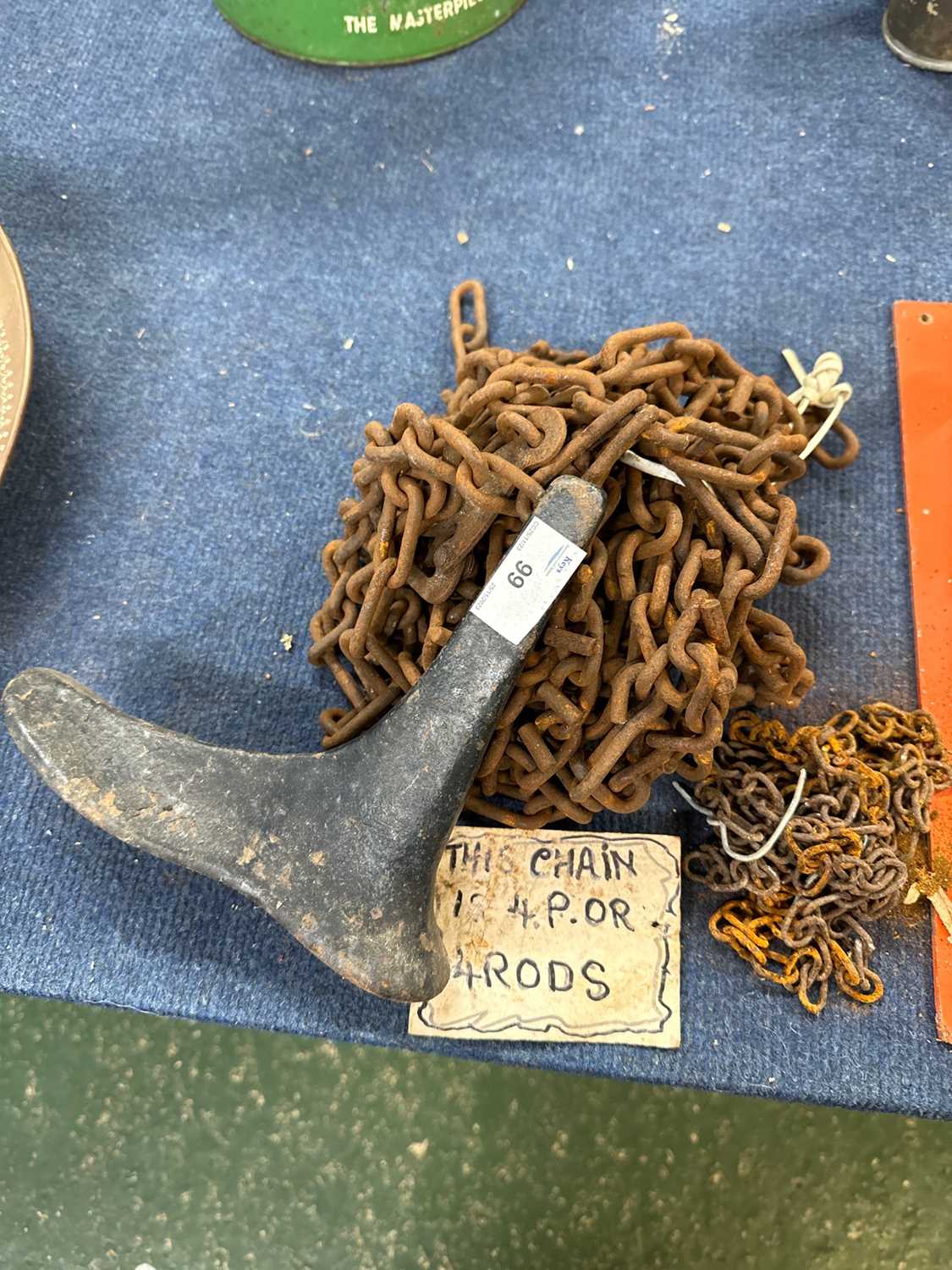Lot 99 - An iron shoe makers last and a quantity of chain
