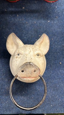 Lot 114 - Cast metal pigs head towel ring
