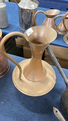 Lot 128 - A large copper jug