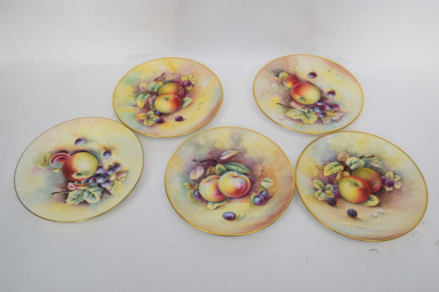 Lot 146 - Group of five Minton Apple plates signed by...