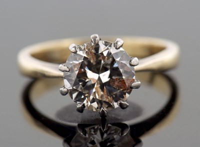 Lot 11 - A diamond solitaire ring, the round old...