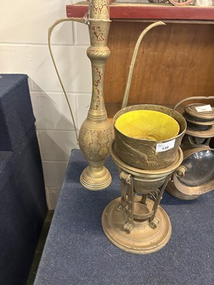 Lot 139 - Large Islamic brass coffee pot and a further...