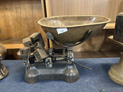 Lot 142 - Vintage brass and iron scales with weights