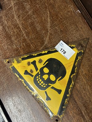 Lot 178 - Triangular enamel Danger sign with skull and...