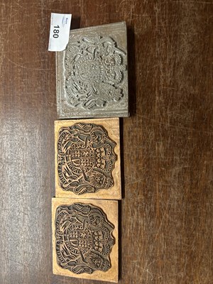 Lot 180 - Three small printing blocks decorated with...