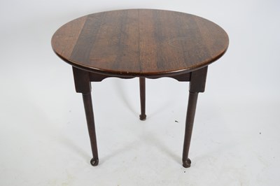 Lot 414 - 18th century oak and elm cricket table, the...