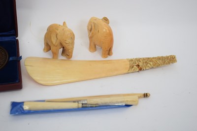Lot 174 - Box containing two ivory carved elephants,...
