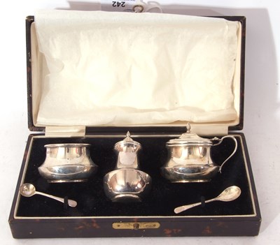 Lot 242 - George V cased three piece condiment set of...