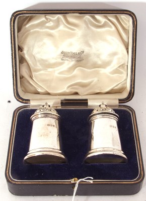 Lot 248 - Cased heavy pair of George V peppers of castle...