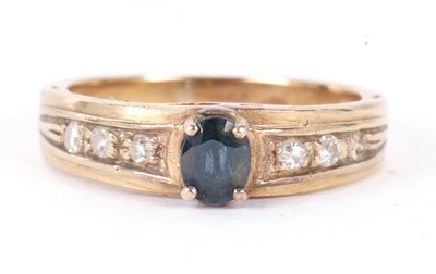 Lot 59 - A 9ct topaz and diamond ring, the oval topaz...