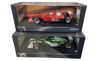 Lot 217 - A pair of boxed Hotwheels 1:18 scale model...