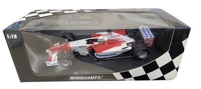 Lot 211 - A boxed Minichamps 1:18 scale model racing car,...