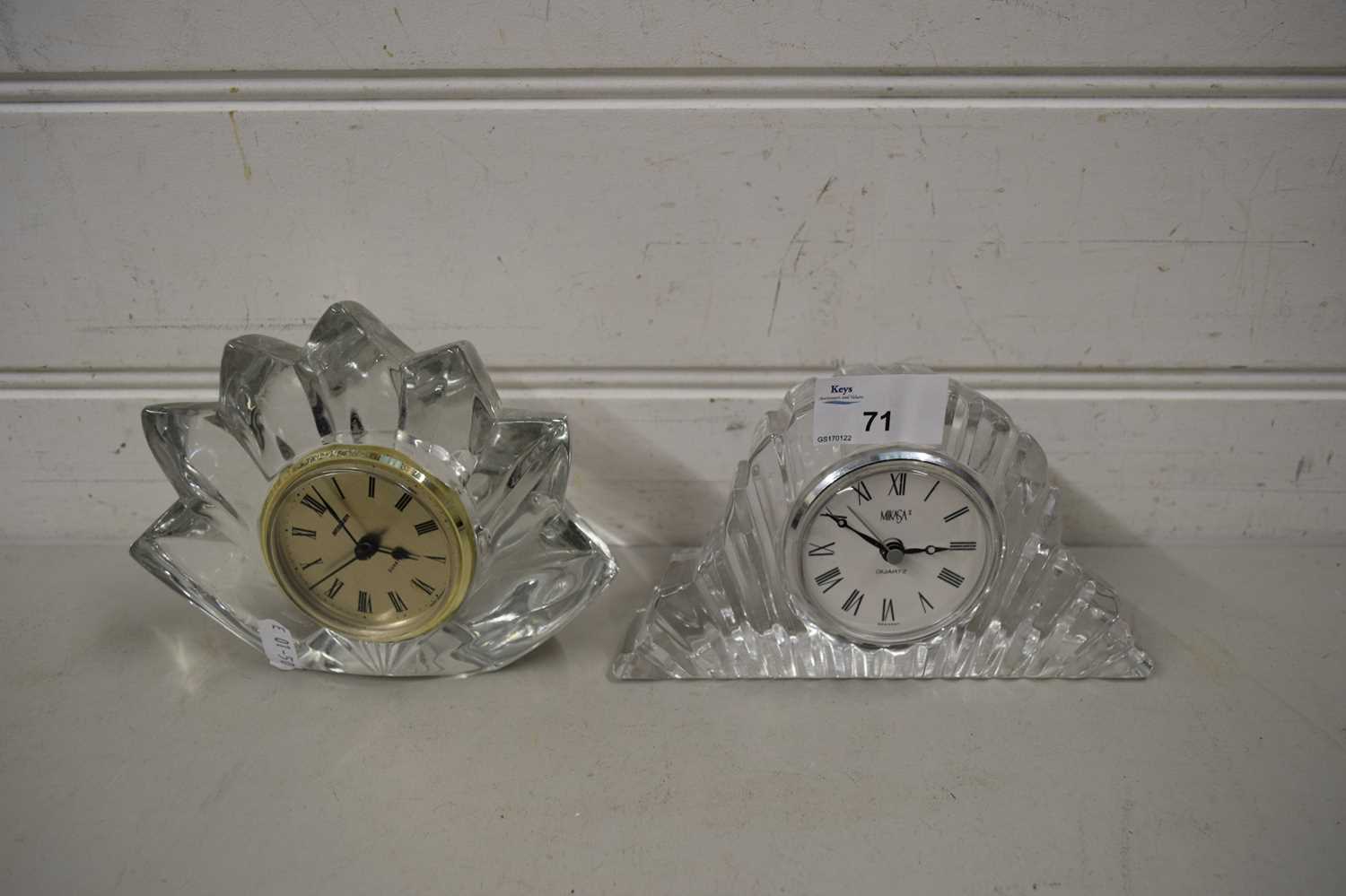 Lot 71 - TWO SMALL GLASS CASED MANTEL CLOCKS