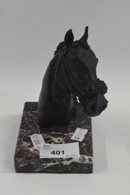 Lot 344 - A metal model of a horses head on rectangular...