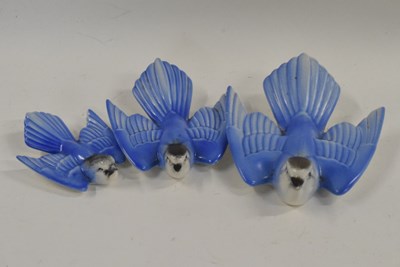 Lot 370 - A group of Poole Pottery swallows with blue...