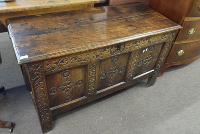 Lot 494 - An 18th Century oak coffer with three panelled...