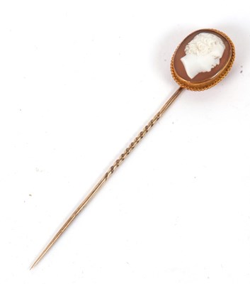 Lot 64 - A cameo stick pin, the oval shell cameo,...
