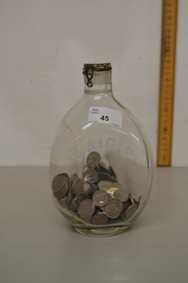Lot 45 - A Haig Whisky bottle filled with sixpence coins