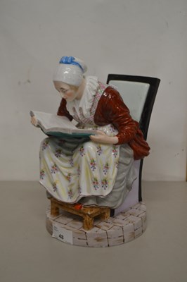 Lot 48 - Continental porcelain model of a lady reading