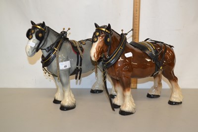 Lot 49 - A pair of porcelain model Shire horses