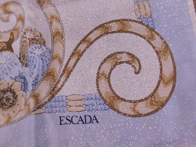 Lot 113 - An Escada and a Must de Cartier scarf, each...