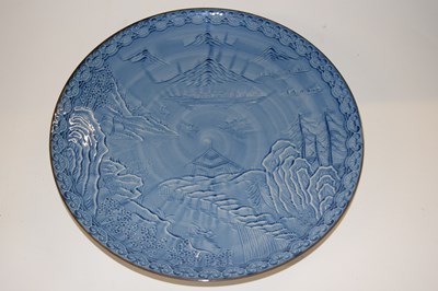 Lot 280 - A Japanese porcelain dish with a blue and...