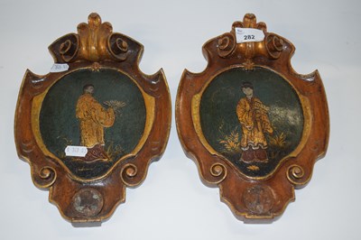 Lot 282 - Two wooden shields with painted Chinese...