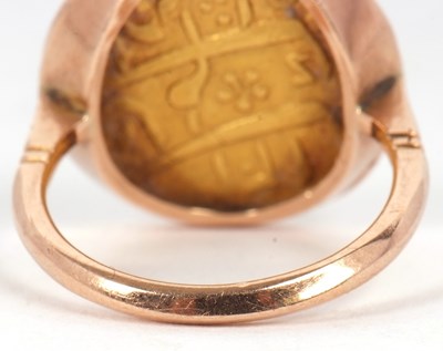 Lot 24 - A Middle Eastern coin ring, the coin with a...