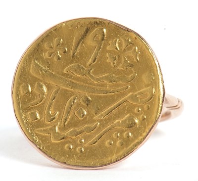 Lot 24 - A Middle Eastern coin ring, the coin with a...