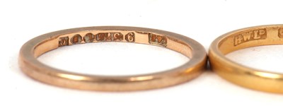 Lot 54 - Three gold rings: an 18ct diamond ring,...