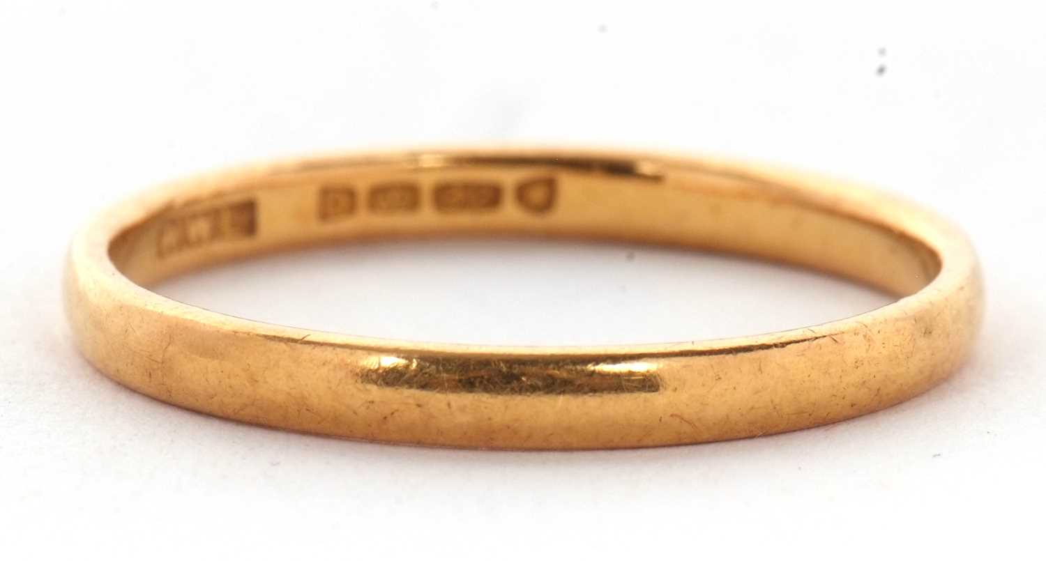 Lot 59 - A 22ct wedding band, London 1939, size U, 3.7g