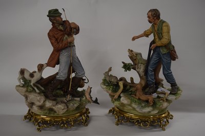 Lot 333 - A pair of Capodimonte porcelain figures, one...