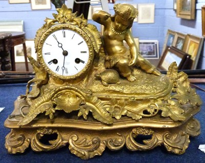 Lot 364 - A late 19th Century gilt brass clock, the...