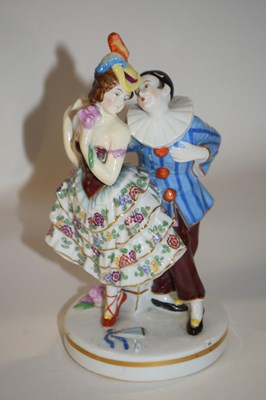 Lot 352 - A continental porcelain model of a Harlequin...