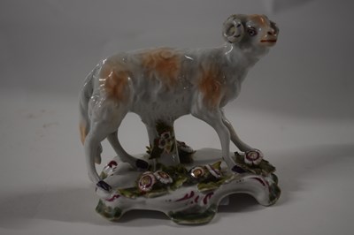 Lot 358 - An English porcelain model of a ram on shaped...