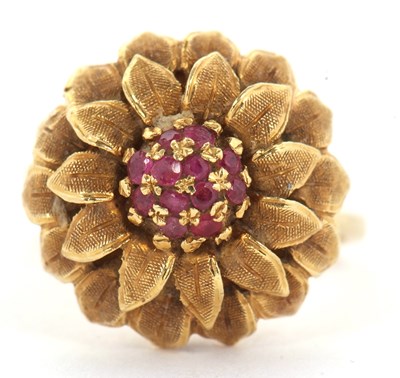 Lot 18 - A 1960's 18ct and ruby flower ring, set to...