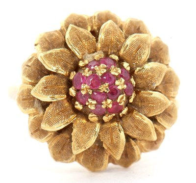 Lot 18 - A 1960's 18ct and ruby flower ring, set to...