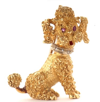 Lot 69 - An 18ct poodle brooch, the seated poodle set...